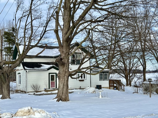 view of snow covered property