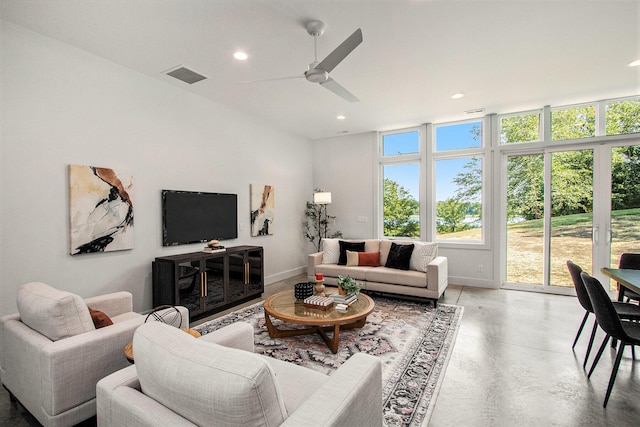 living room featuring ceiling fan