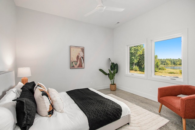 bedroom with light carpet and ceiling fan