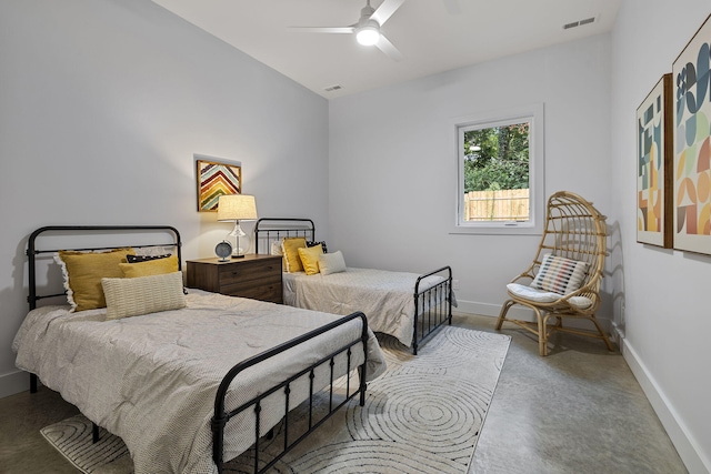 bedroom featuring concrete flooring and ceiling fan