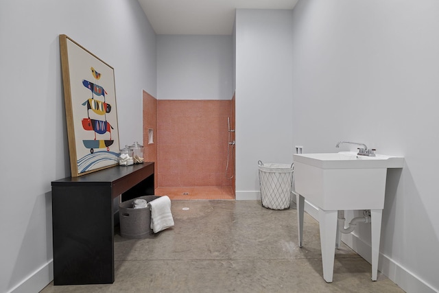 bathroom with concrete floors