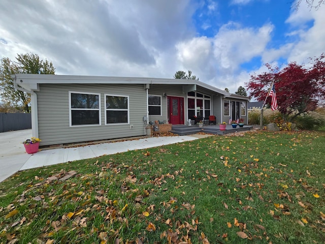 view of front of property with a front lawn