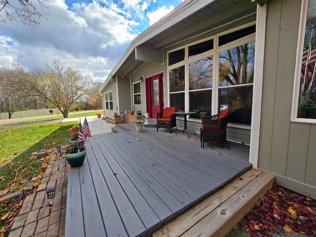 wooden deck with outdoor lounge area