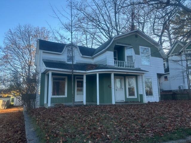 view of front of home with a balcony