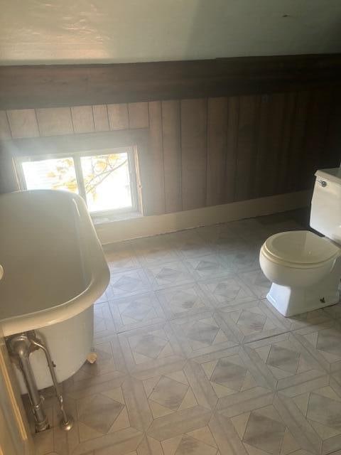 bathroom featuring a tub to relax in