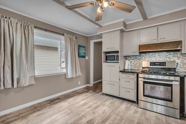 kitchen featuring stainless steel appliances, decorative backsplash, ceiling fan, crown molding, and light hardwood / wood-style flooring