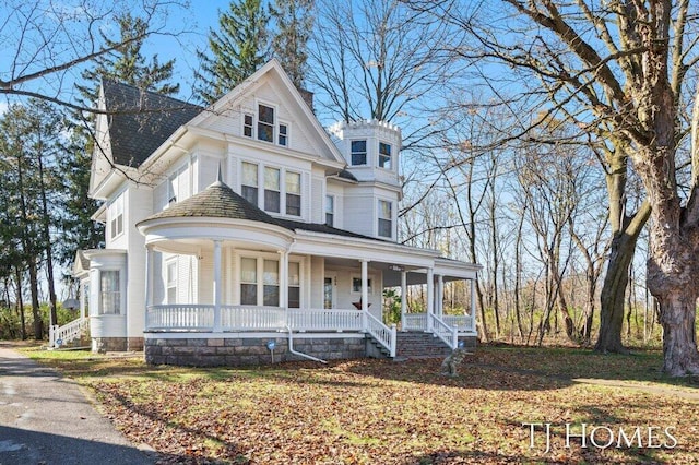 victorian home featuring covered porch