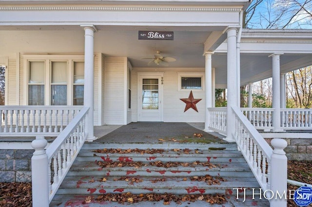 entrance to property with ceiling fan and a porch