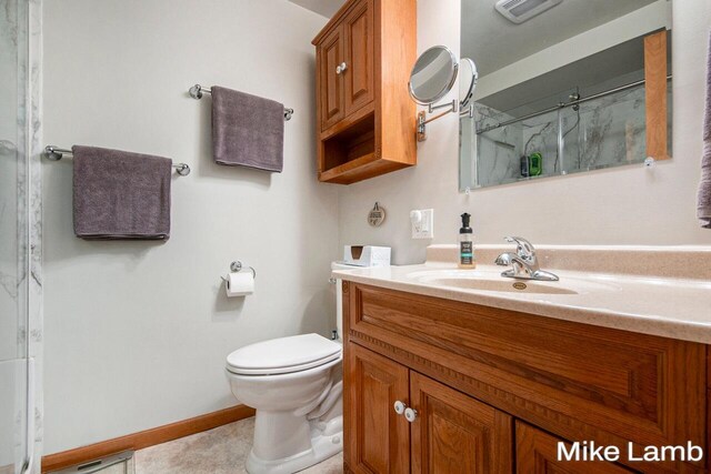 bathroom with vanity, toilet, and a shower with curtain