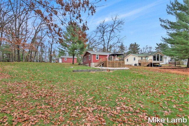 view of yard with a deck