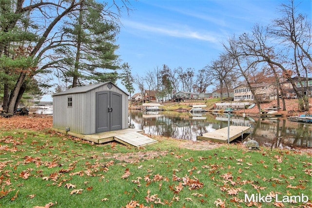 exterior space featuring a water view and a yard