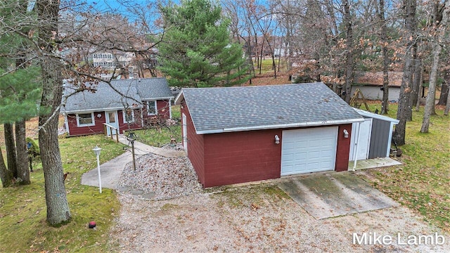 garage with a yard