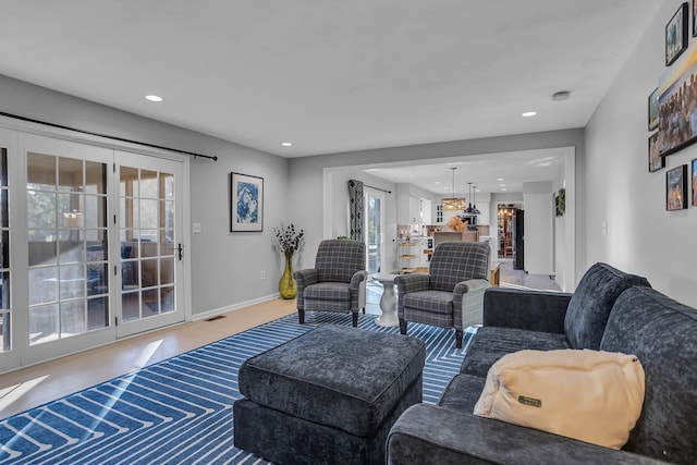 living room featuring plenty of natural light