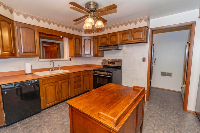 kitchen with decorative backsplash, ceiling fan, sink, dishwasher, and stainless steel range with gas stovetop