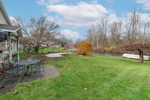 view of yard with a water view