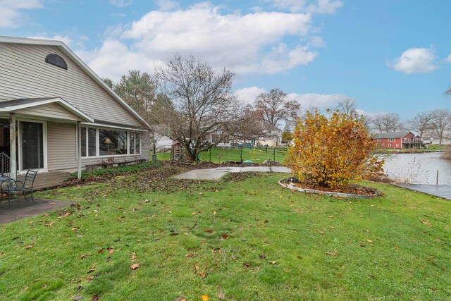 view of yard with a water view