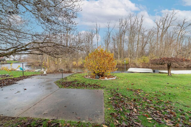 view of yard with a water view