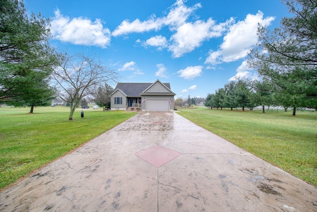 view of front of home featuring a front yard and a garage