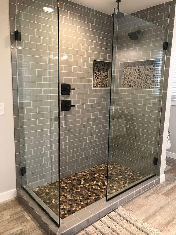 bathroom with hardwood / wood-style floors and a shower with door