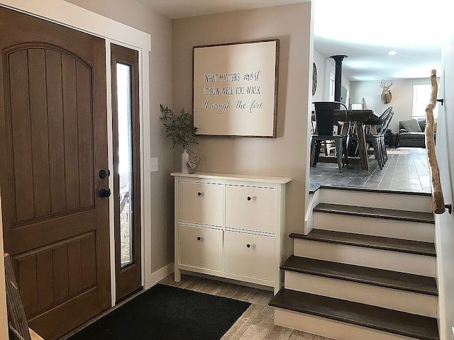 entryway with light hardwood / wood-style floors