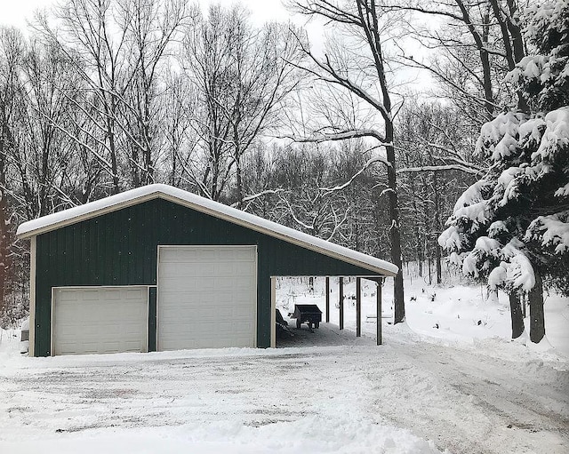 view of snow covered garage