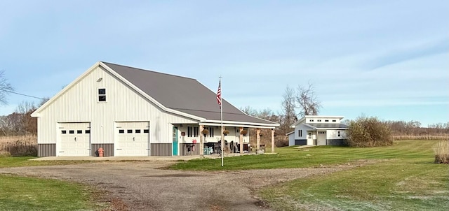 exterior space featuring a yard and a garage