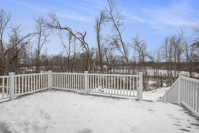 view of snow covered deck