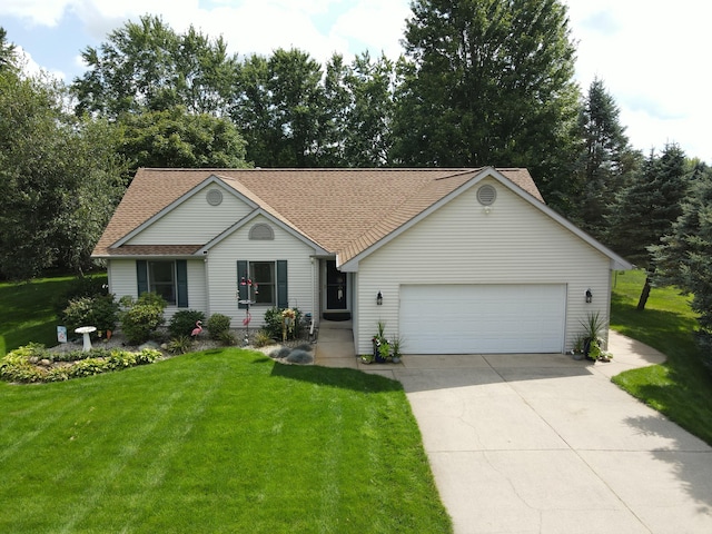 ranch-style house with a garage and a front yard