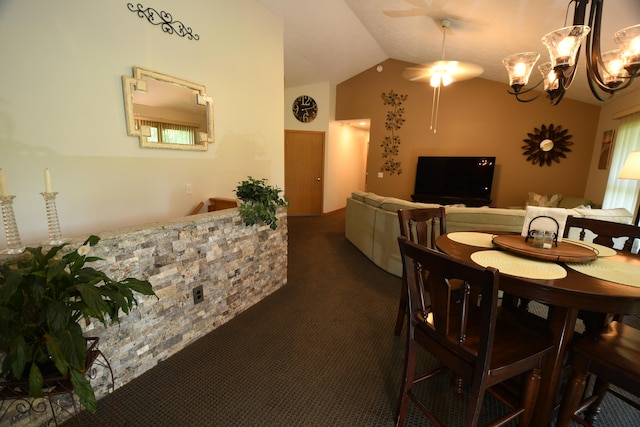 carpeted dining room with ceiling fan and vaulted ceiling