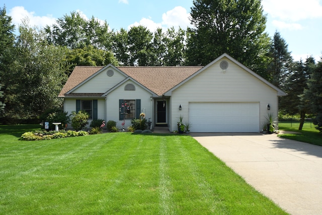 ranch-style home with a front lawn and a garage