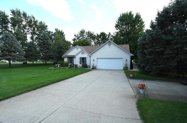 ranch-style house with a garage and a front lawn