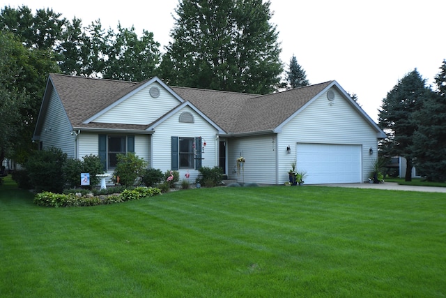 single story home with a garage and a front yard