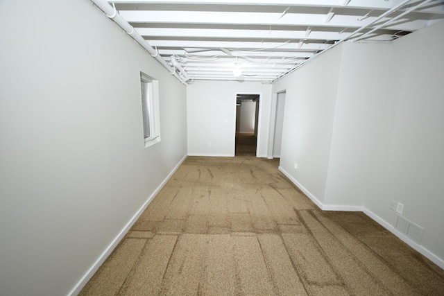 hall featuring carpet