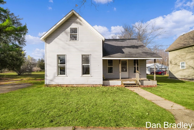 view of front of home with a front lawn and covered porch