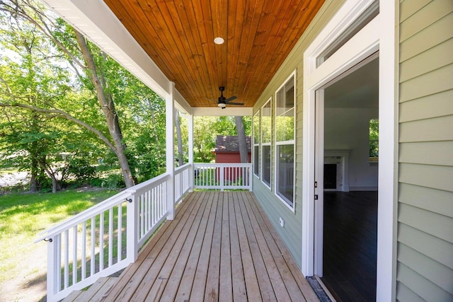 wooden terrace with ceiling fan