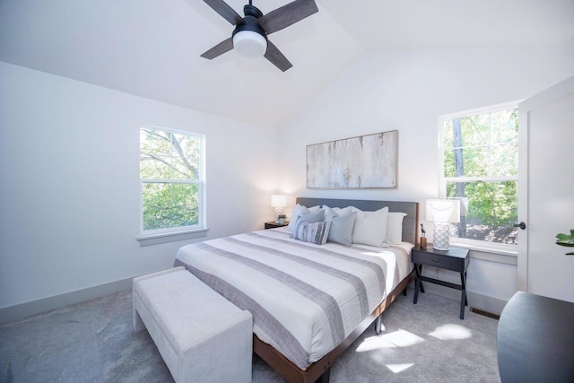 bedroom with carpet floors, ceiling fan, and lofted ceiling