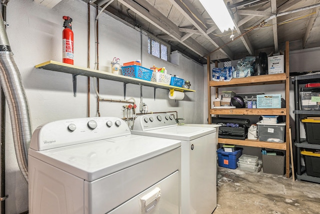 laundry room with washing machine and dryer