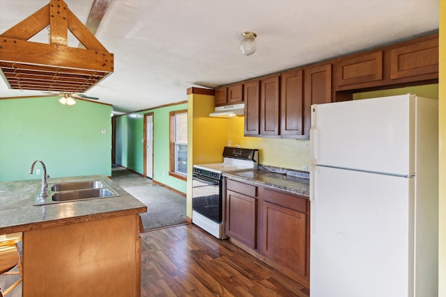 kitchen featuring a kitchen bar, white appliances, ceiling fan, dark wood-type flooring, and sink