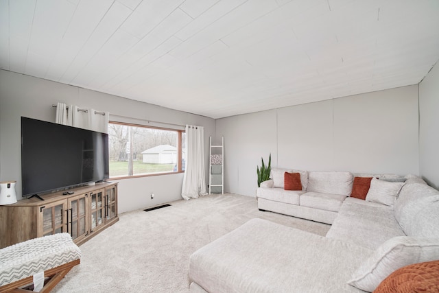 living room with light colored carpet