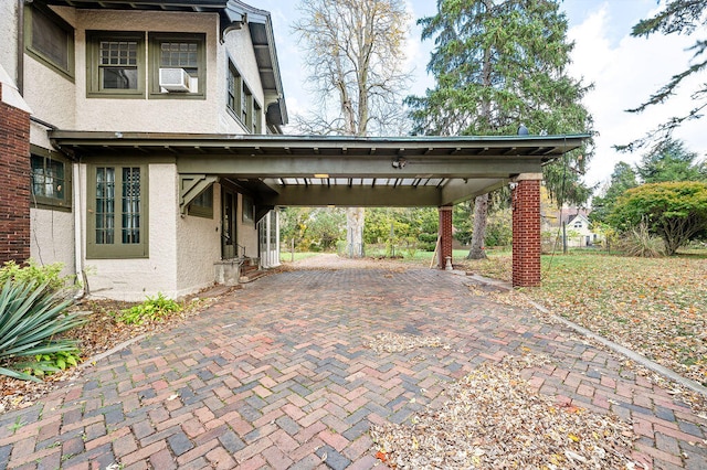 view of parking with a carport