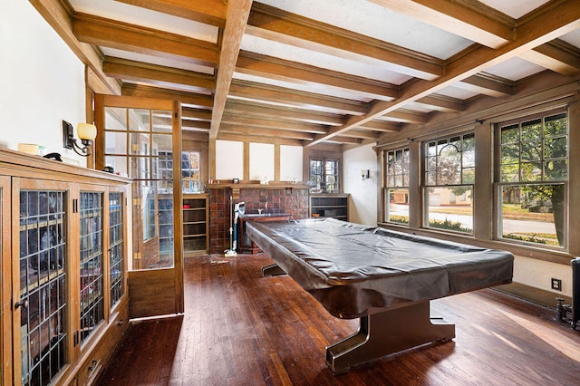 rec room featuring dark wood-type flooring, pool table, and beam ceiling