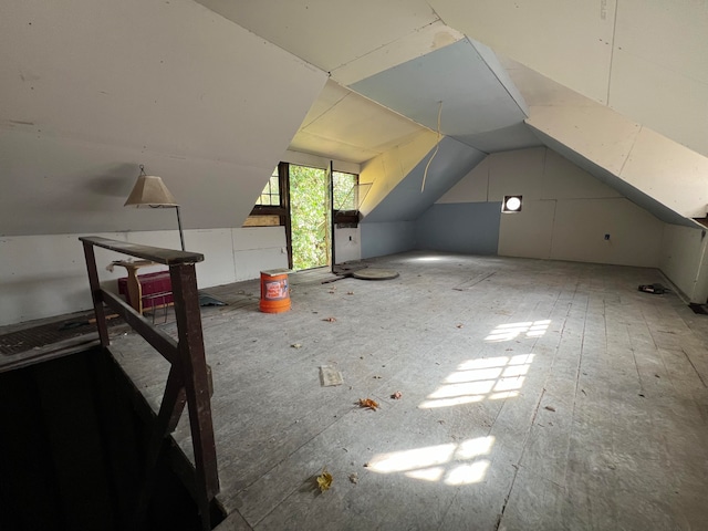 bonus room featuring lofted ceiling