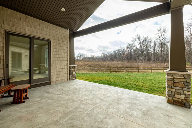 view of patio / terrace with a rural view