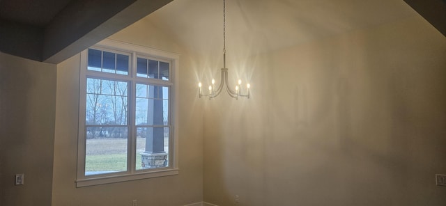 interior space featuring an inviting chandelier