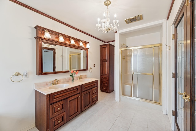 bathroom featuring tile patterned flooring, a notable chandelier, crown molding, an enclosed shower, and vanity