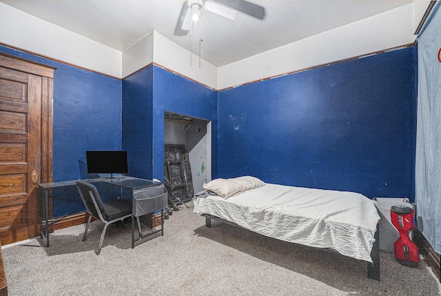 bedroom featuring ceiling fan and carpet flooring