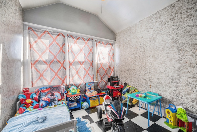 recreation room with lofted ceiling