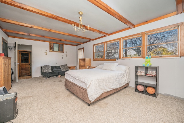 bedroom featuring carpet floors and beam ceiling