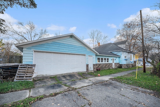 view of home's exterior with a garage