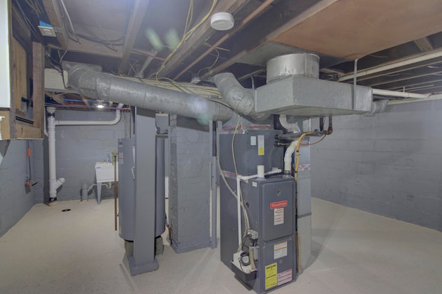 utility room with gas water heater and heating unit